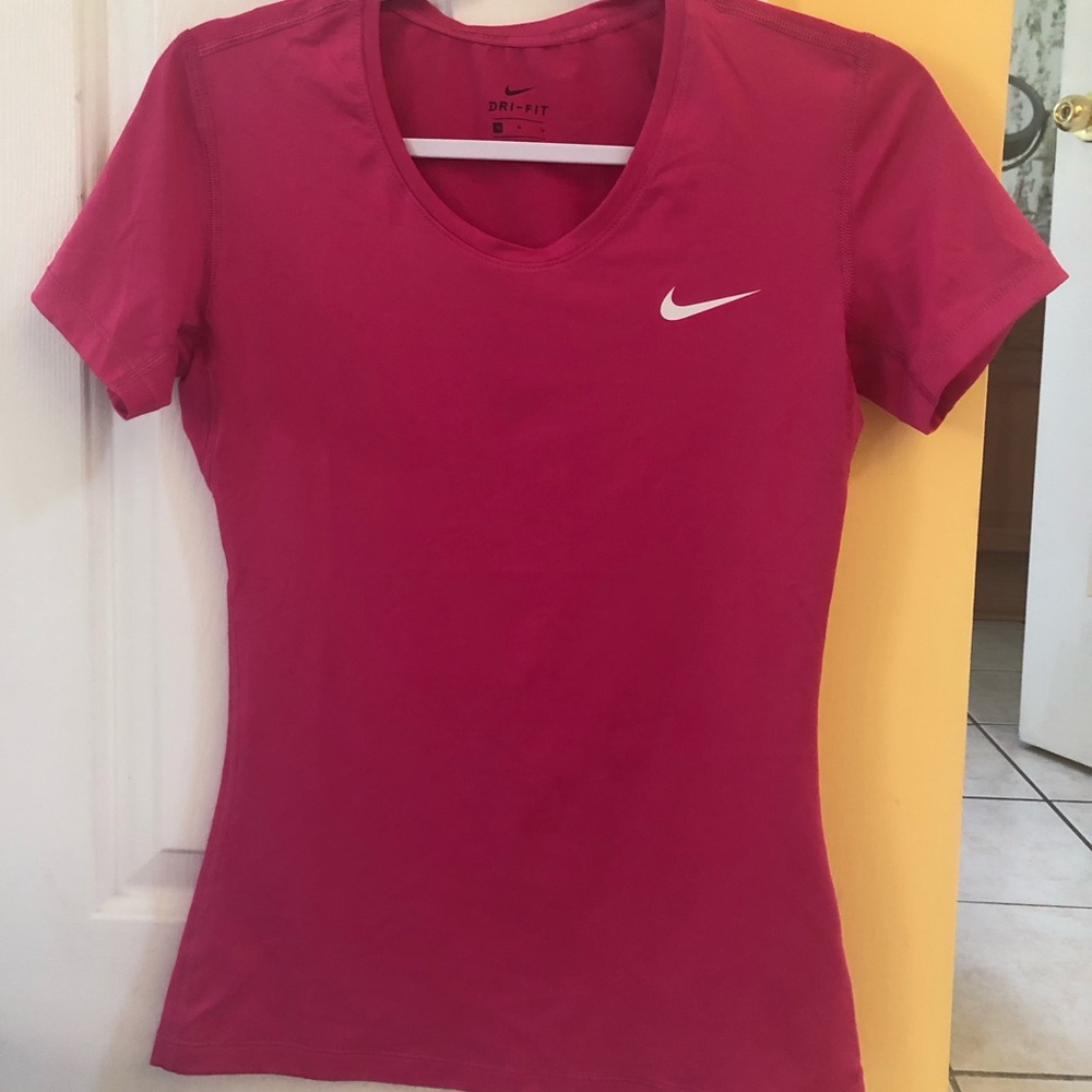 pink nike dri-fit shirt